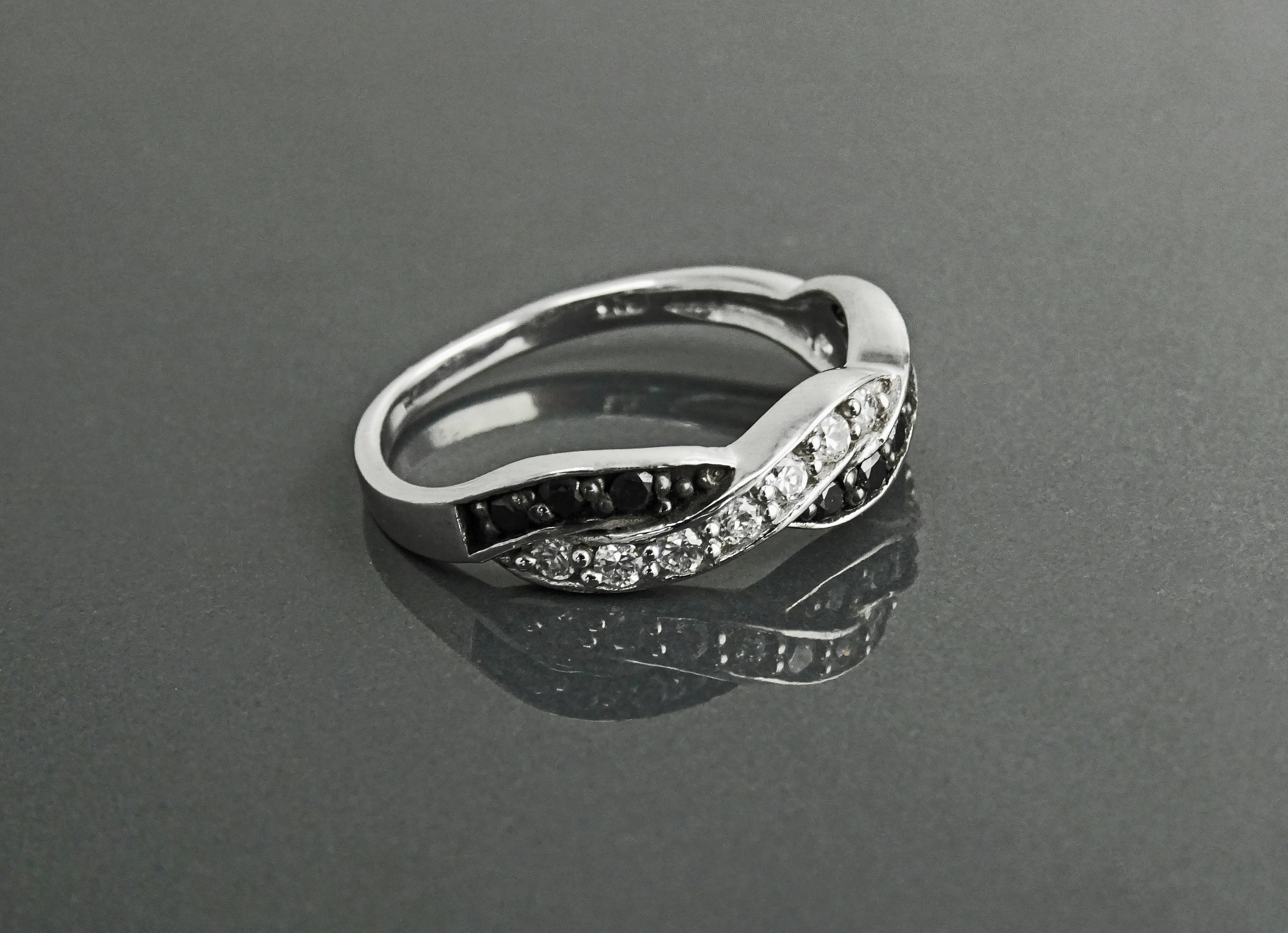 Modern Twist: Black & White Diamond Ring